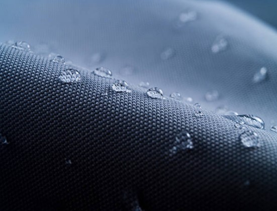water on dark surface